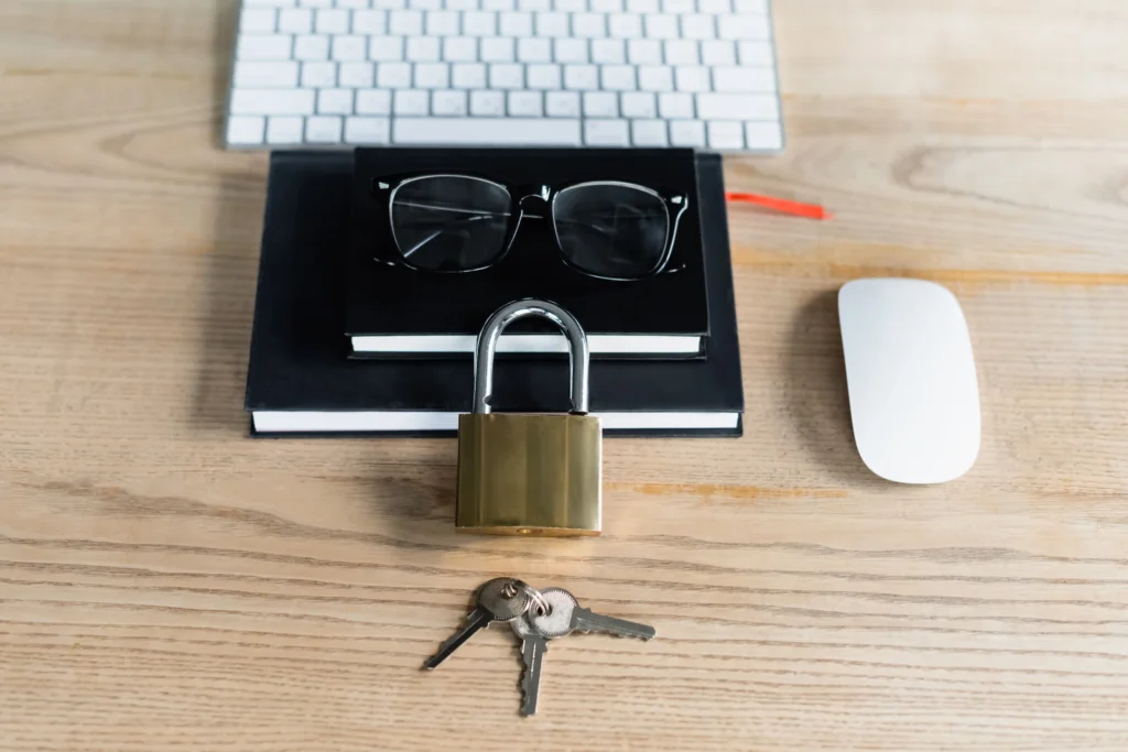 glasses, lock, and keys in the shape of a face, representing artificial intelligence for identity protection